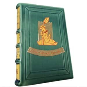 Kirjanmuotoinen posliinipullo